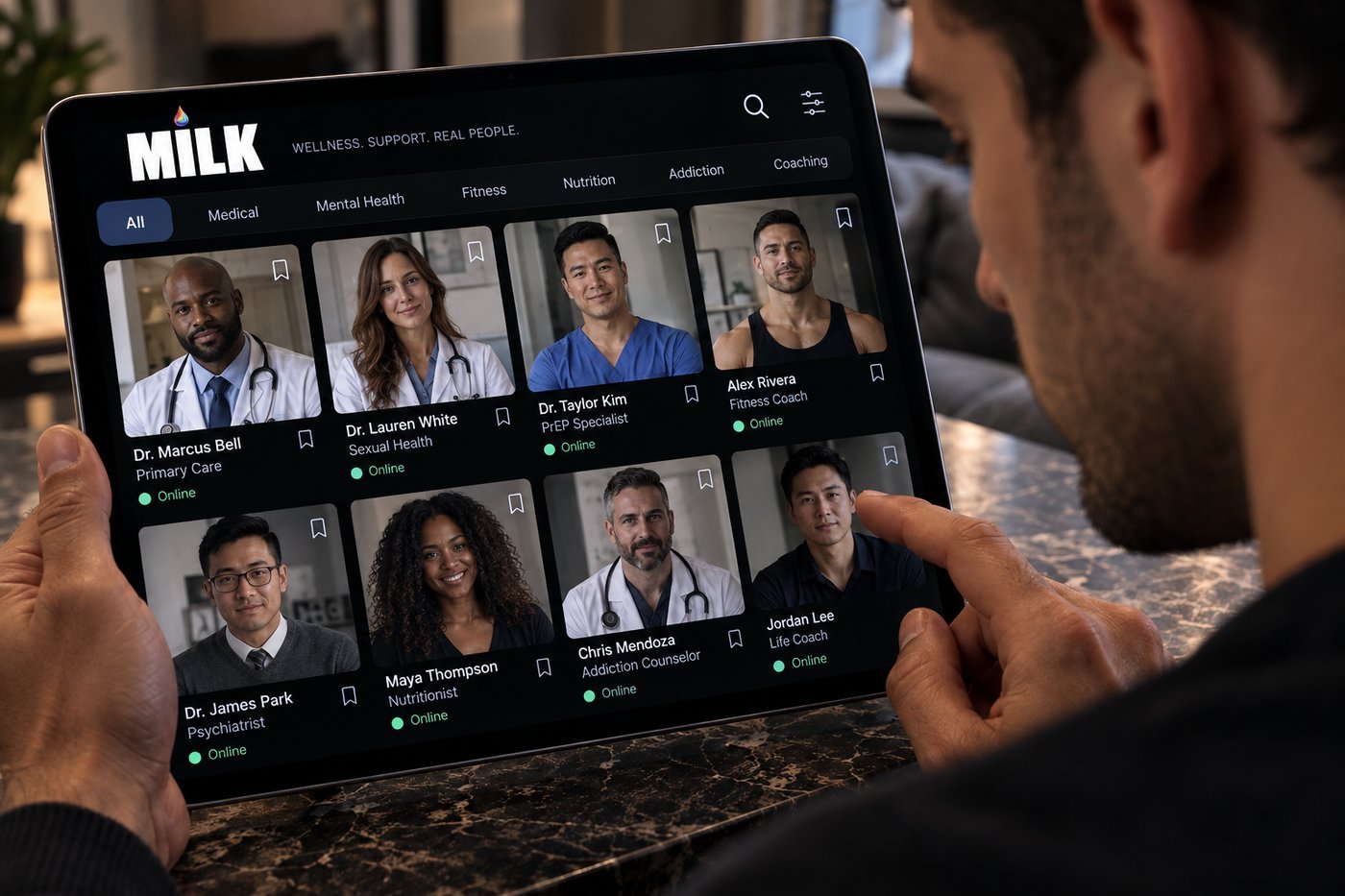 A man browsing the MILK Resources directory on a tablet: doctors, a PrEP specialist, a psychiatrist, a nutritionist, an addiction counselor and coaches, many shown online